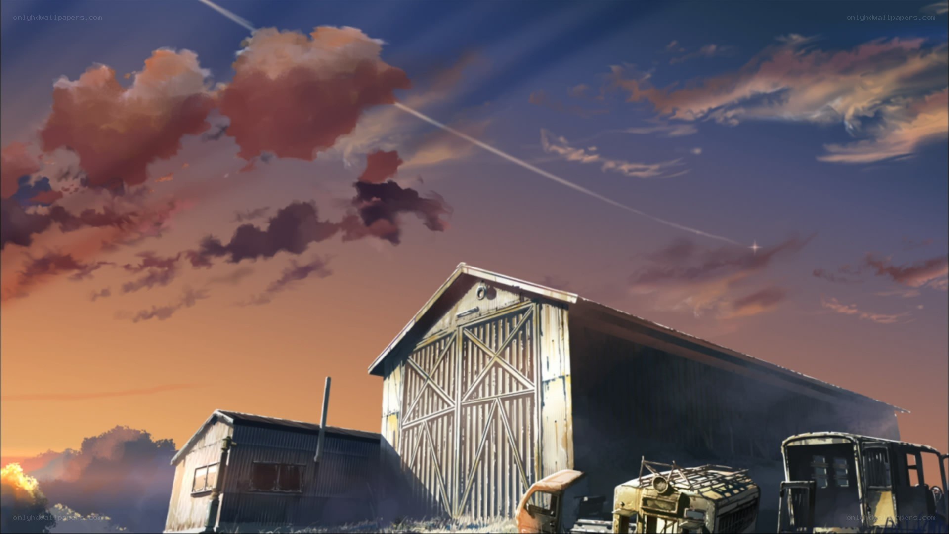 Barn at sunset with clouds