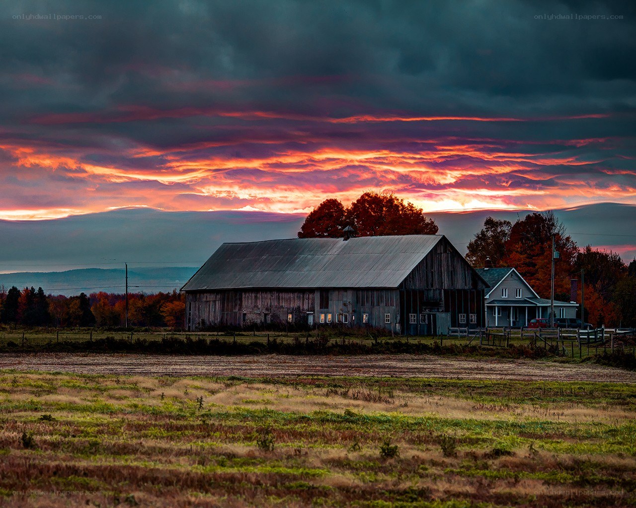 Barn at sunset with colorful sky