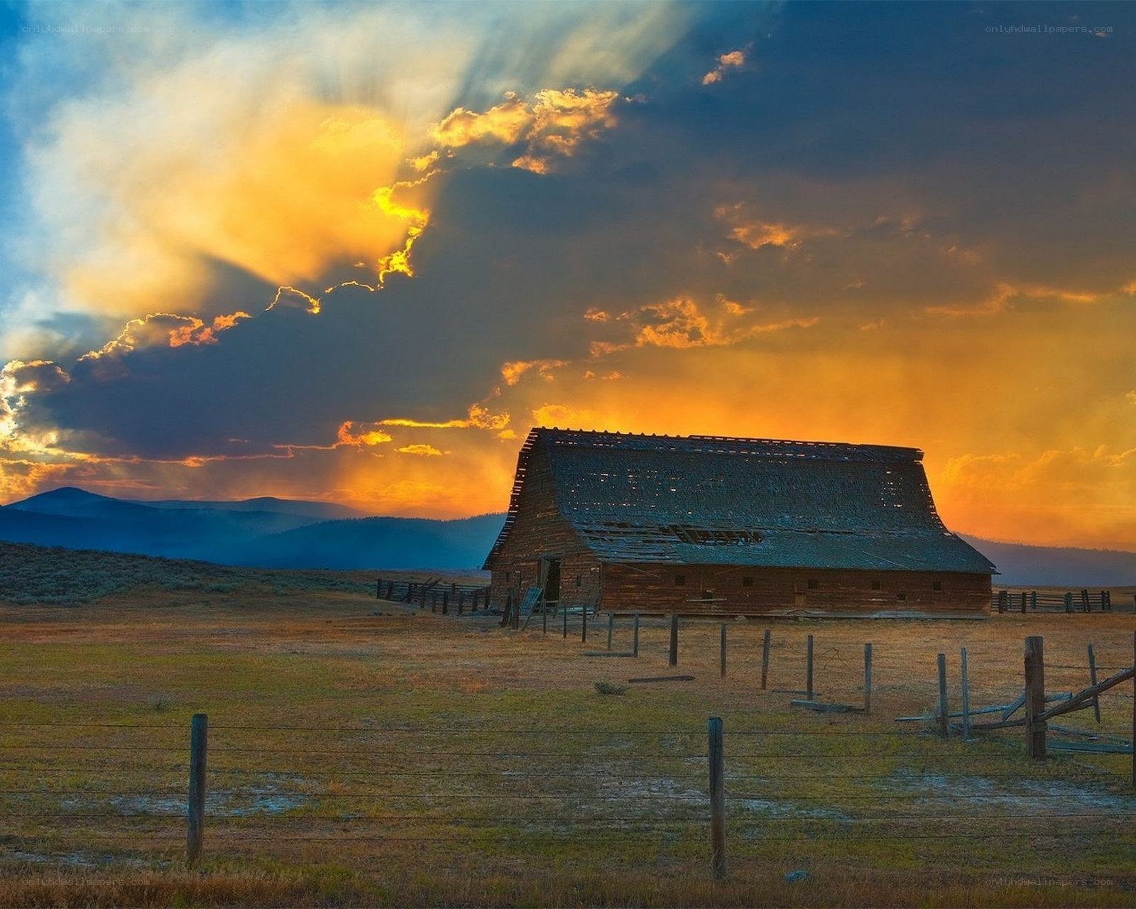 Barn at sunset with dramatic sky