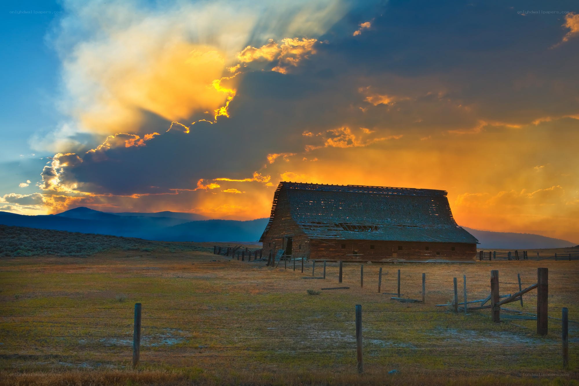 Barn at sunset with dramatic sky