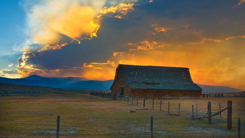 Barn at sunset with dramatic sky