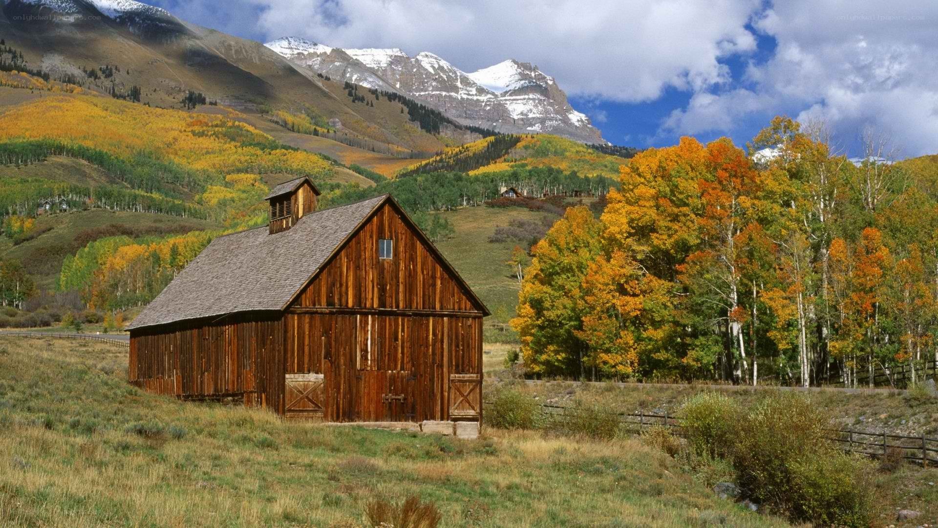 Barn in autumn mountains
