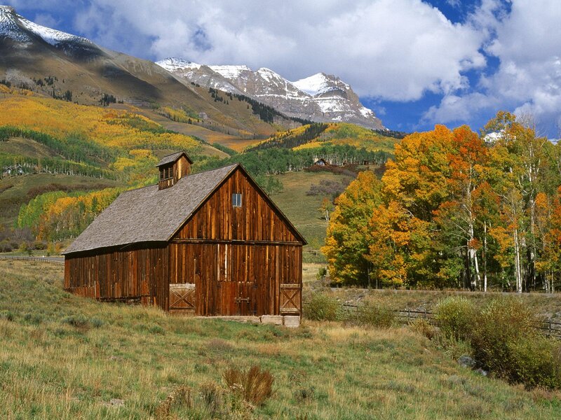 Barn in autumn mountains