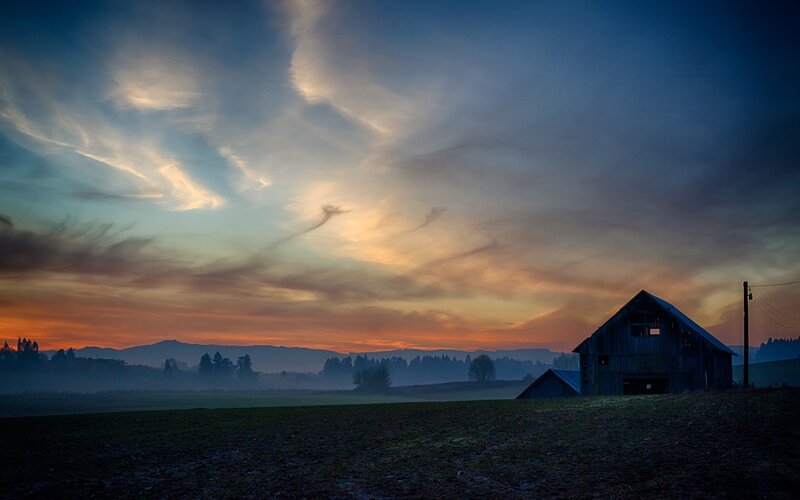 Barn in Field at Dusk
