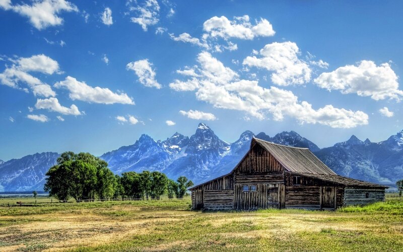 Barn in front of mountains