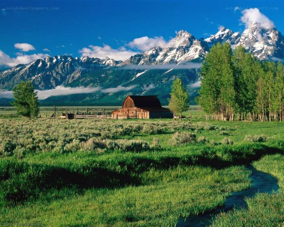 Barn in mountain valley