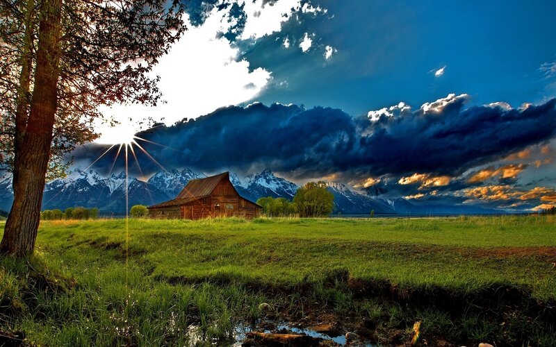 Barn in mountain valley