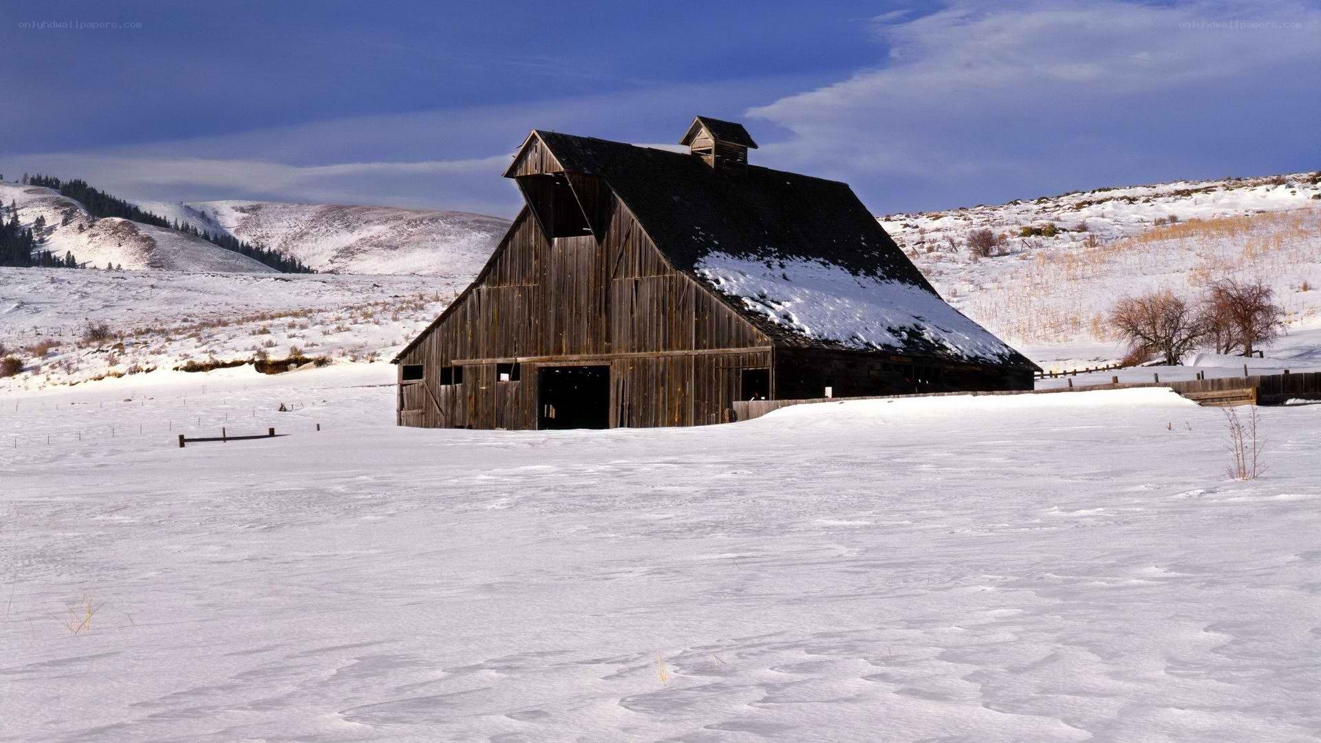 Barn in snowy landscape