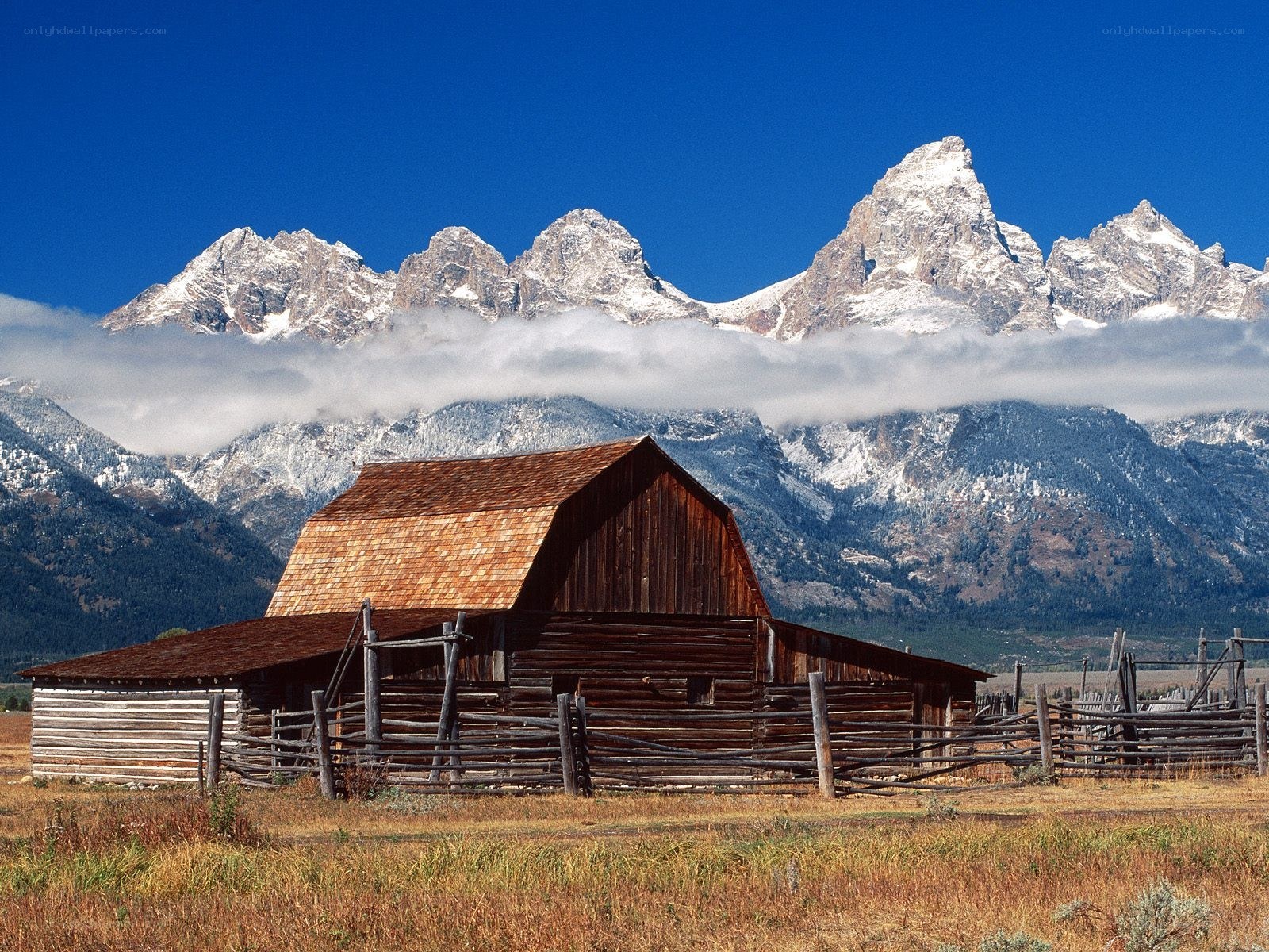 Barn with mountain backdrop