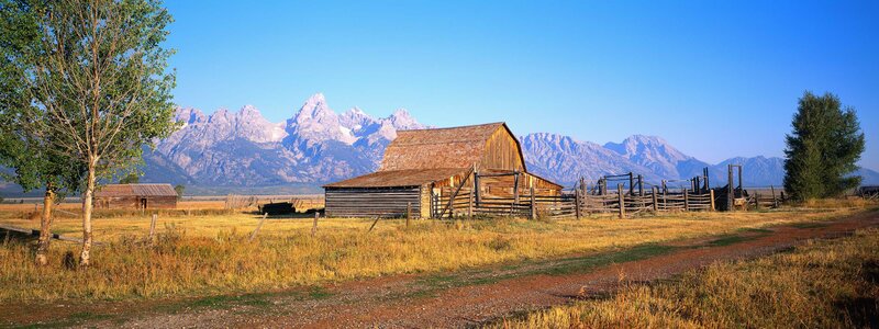 Barn with mountain backdrop