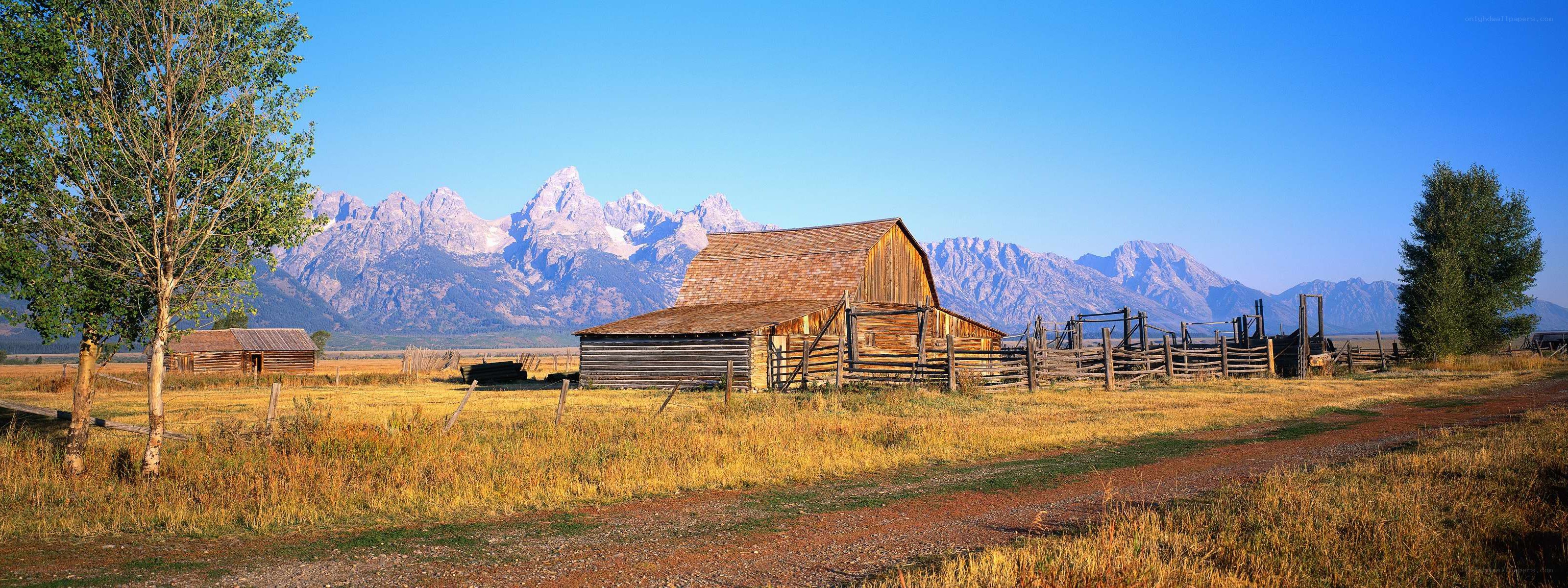 Barn with mountain backdrop