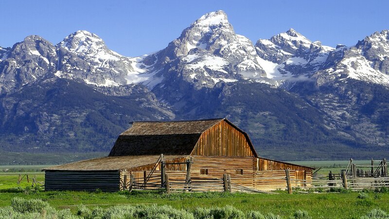 Barn with mountain backdrop