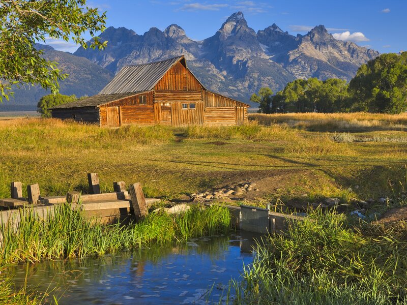 Barn with mountain backdrop