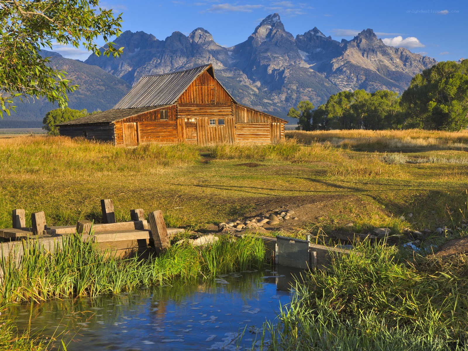 Barn with mountain backdrop