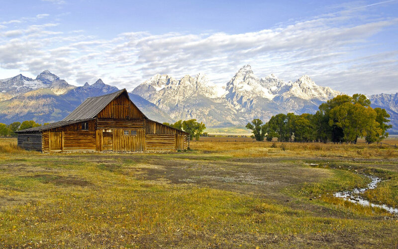 Barn with mountain backdrop