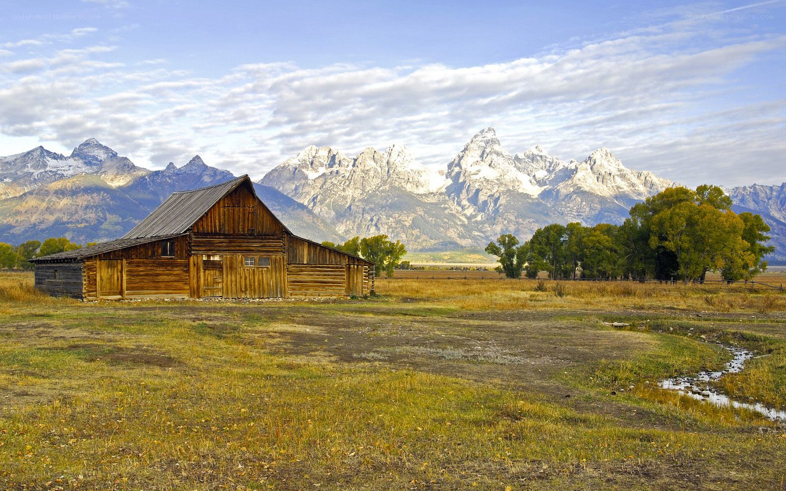Barn with mountain backdrop