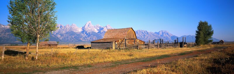 Barn with mountain backdrop