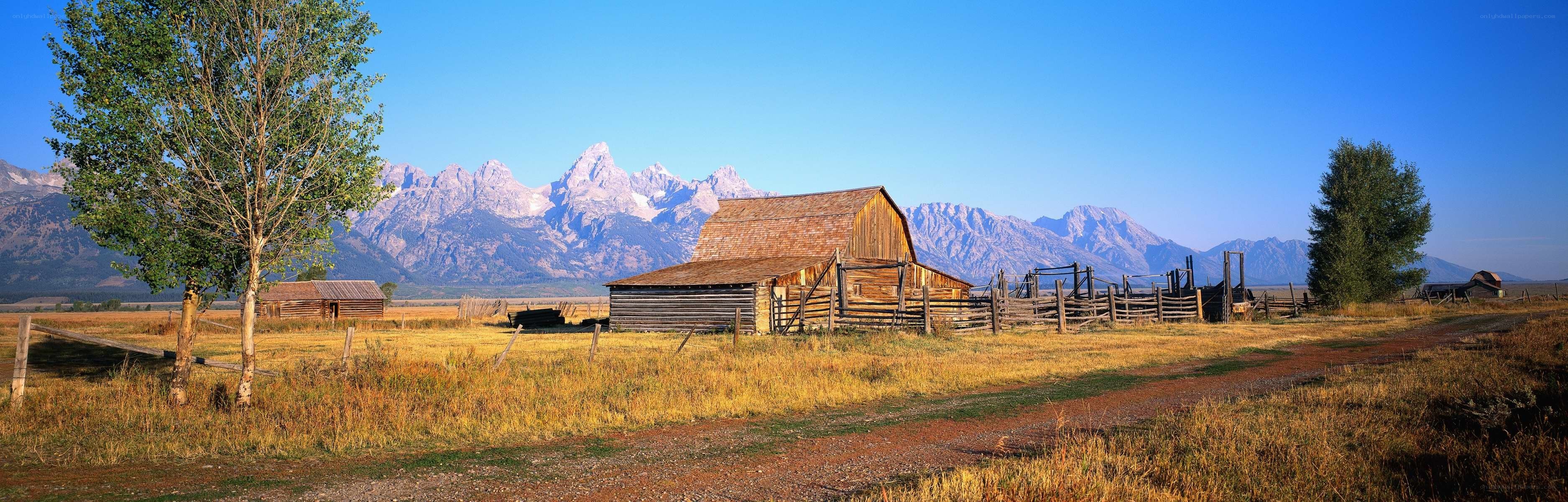 Barn with mountain backdrop
