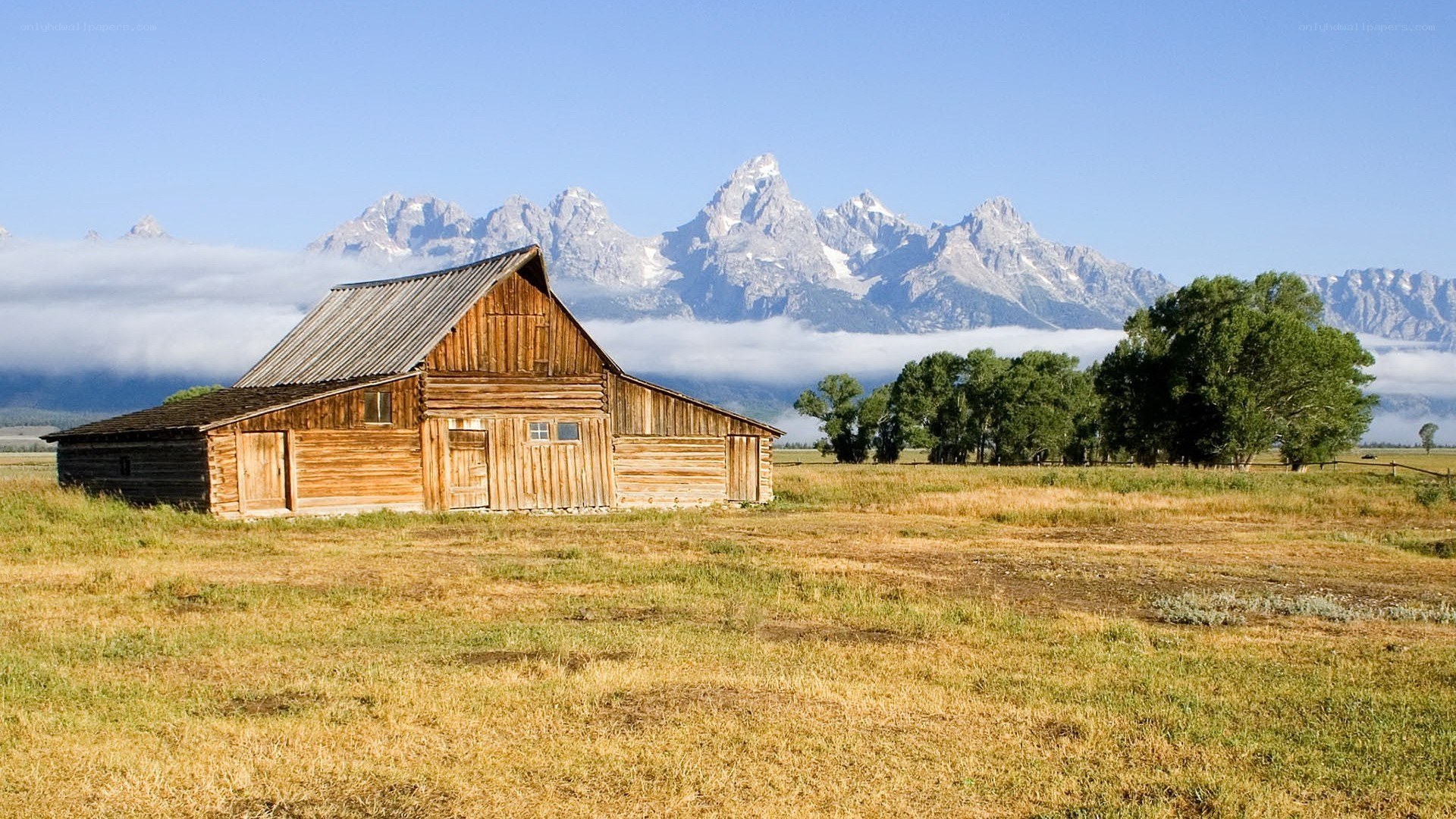 Barn with mountain backdrop