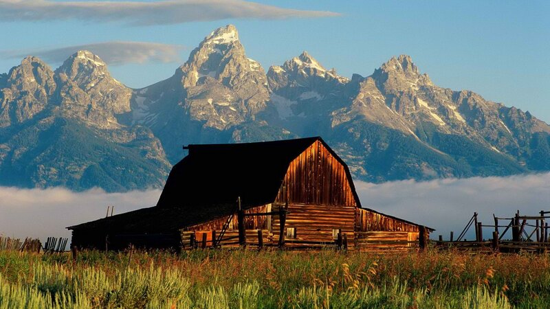 Barn with mountain backdrop