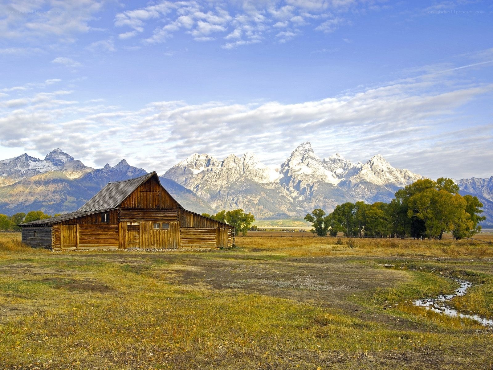 Barn with mountain backdrop