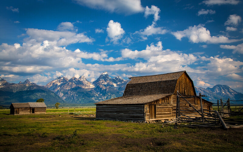 Barns with mountain backdrop