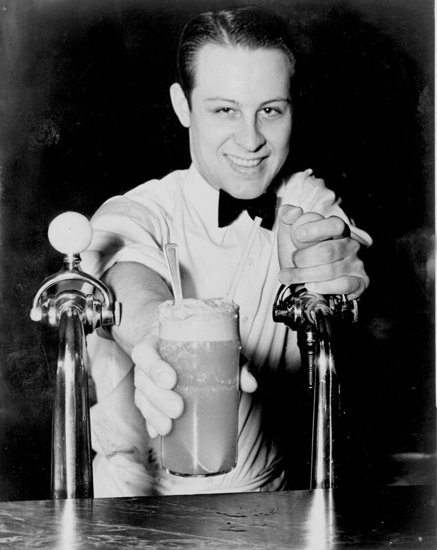 Bartender serving a drink