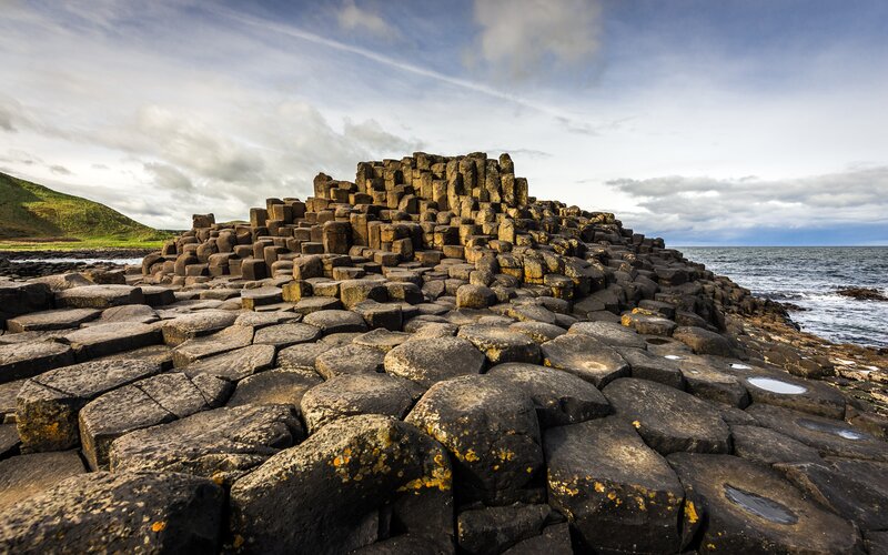 Basalt Columns at Sea — Black, Dramatic, Afternoon