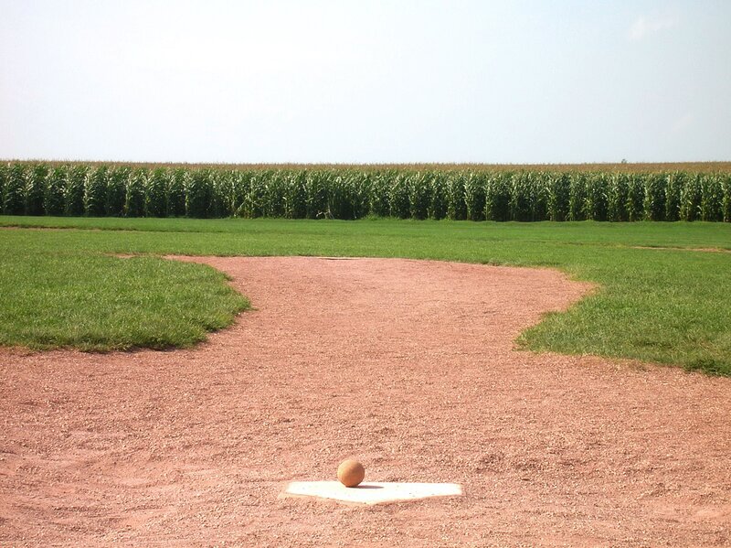 Baseball field with cornfield background