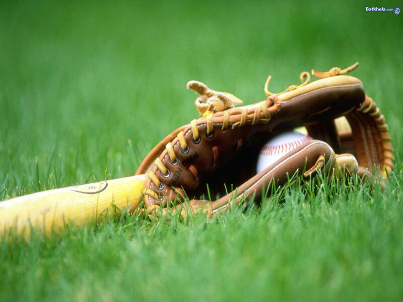 baseball gear on grass