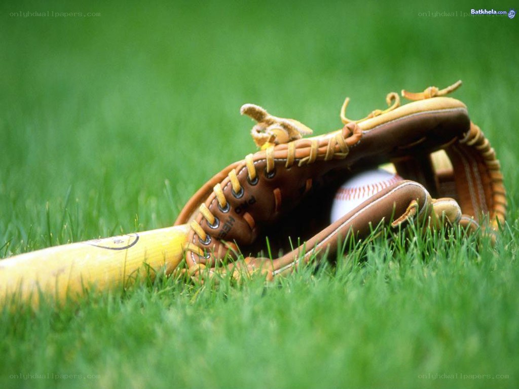 baseball gear on grass