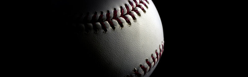 Baseball on black background