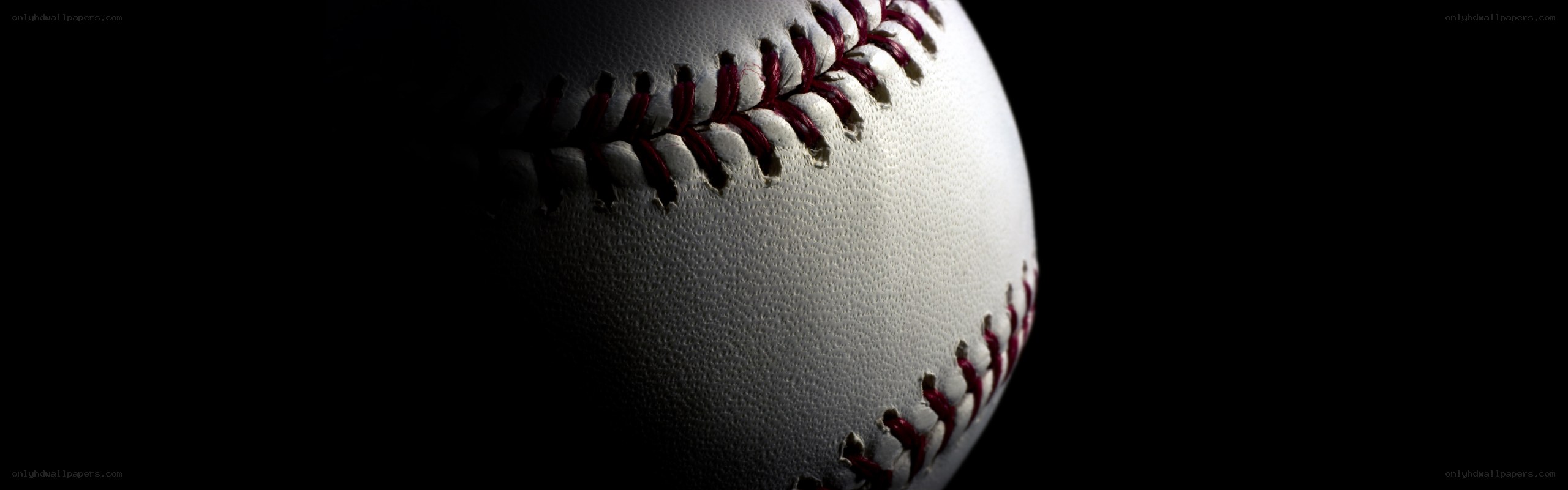 Baseball on black background