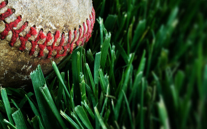 Baseball on green grass