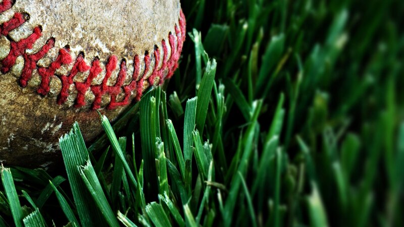 Baseball on green grass