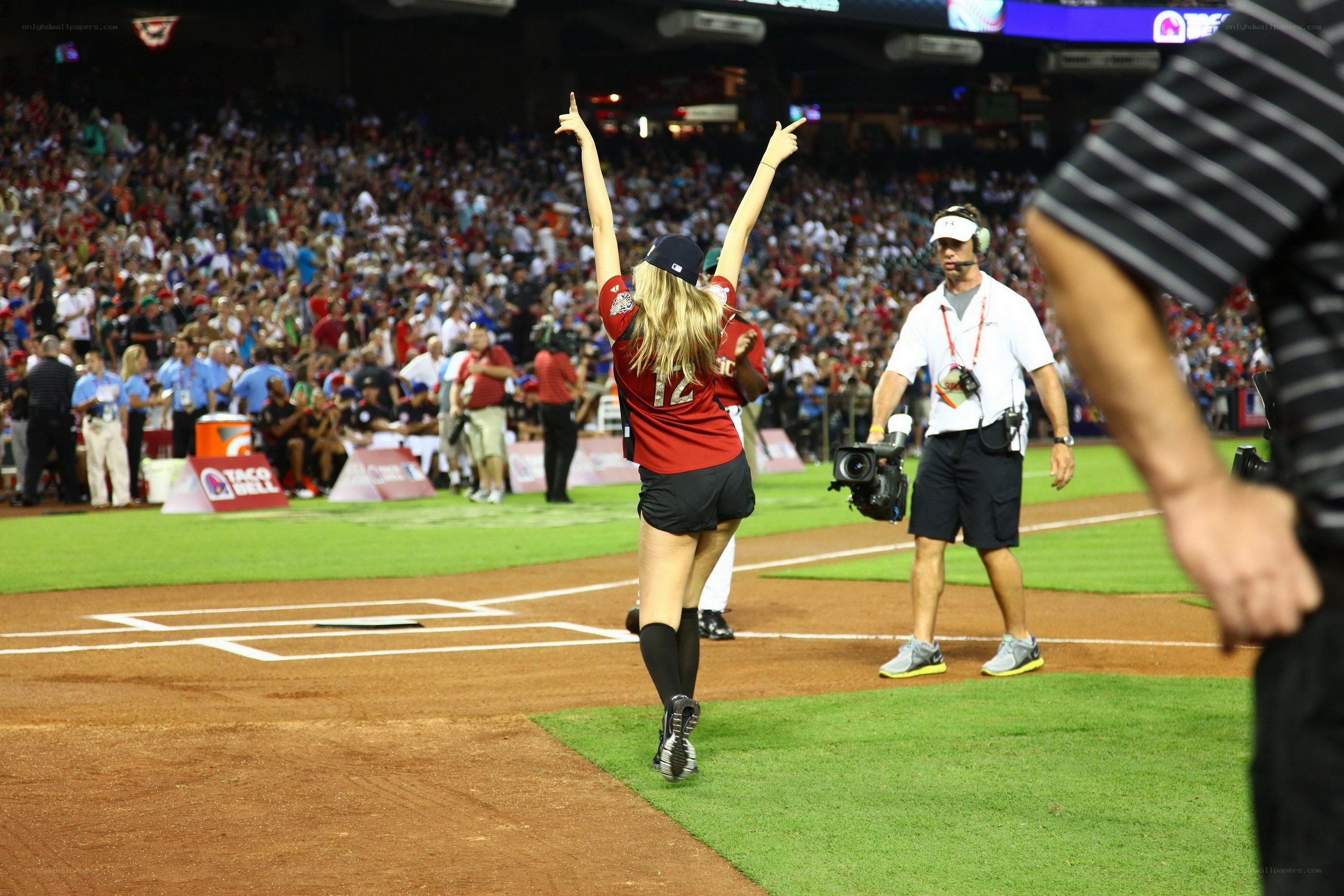 Baseball player celebrating on field