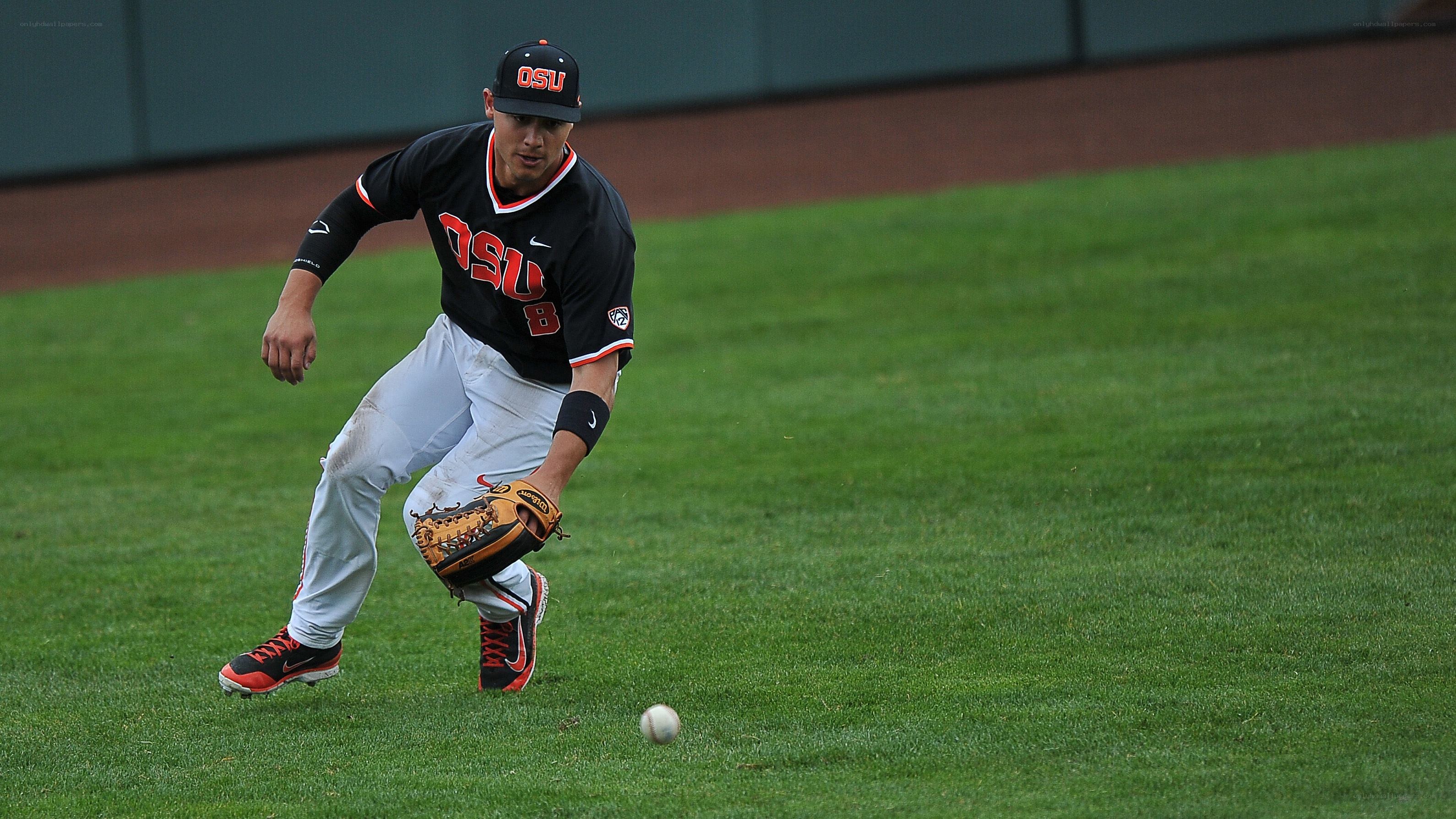 baseball player fielding ball