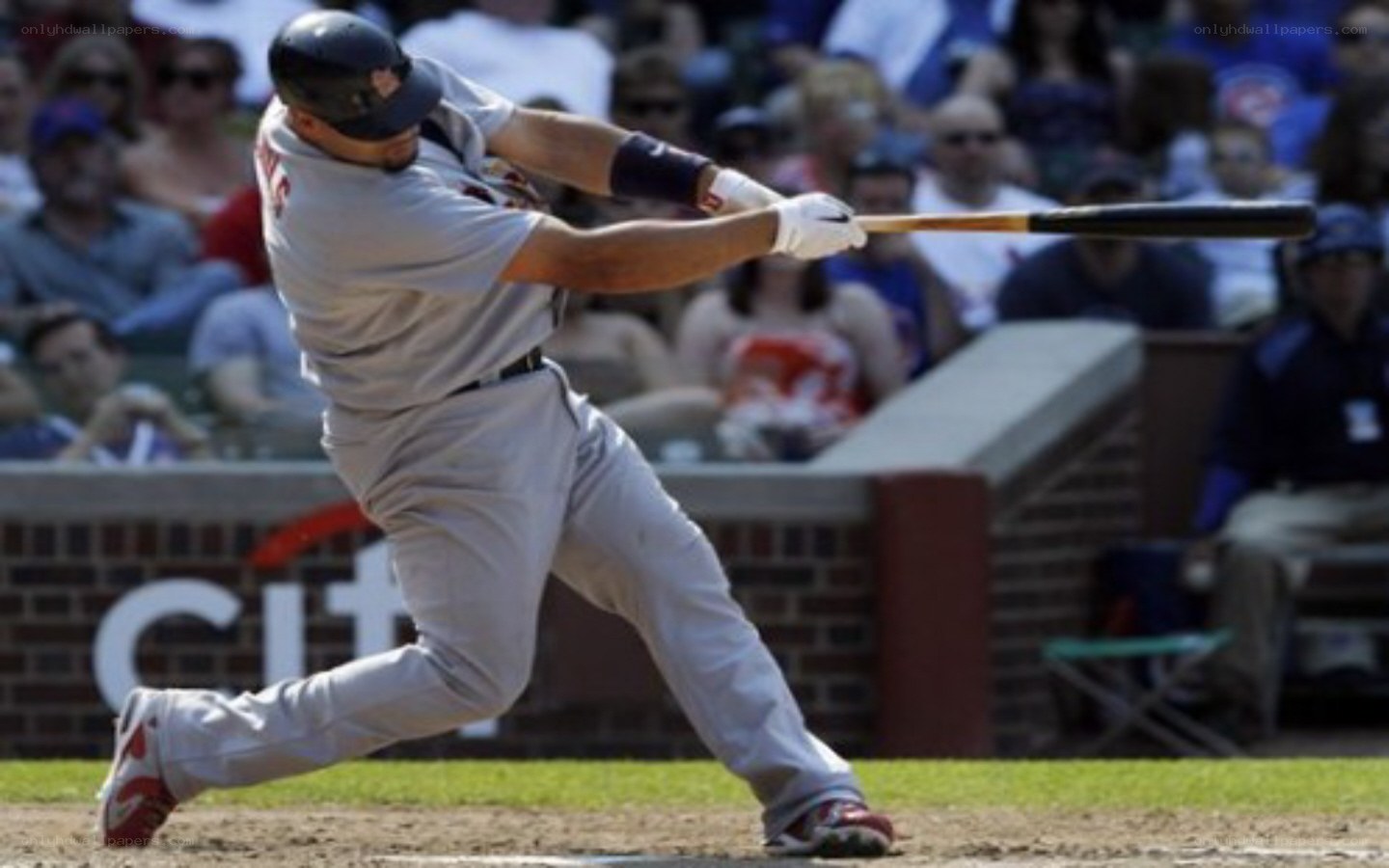 baseball player hitting a ball