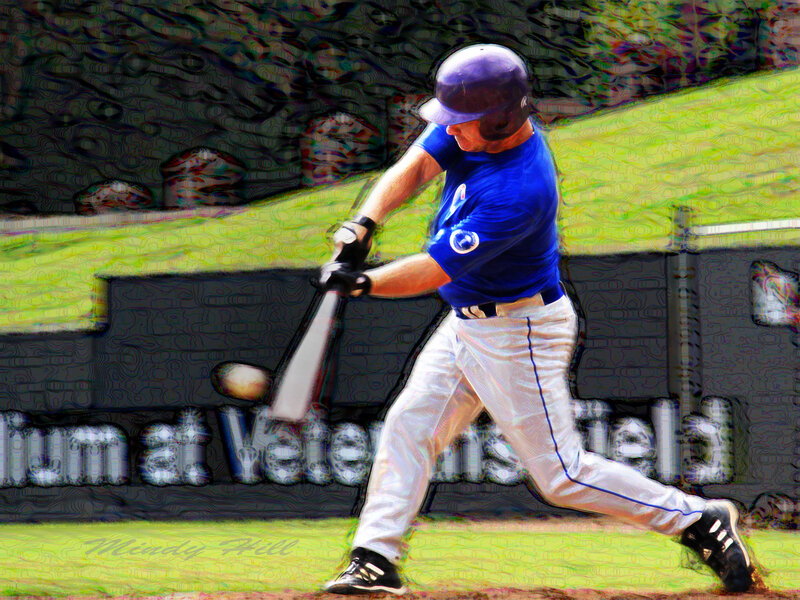 baseball player hitting a ball