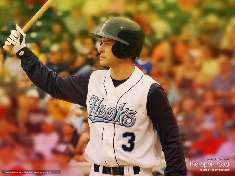 baseball player holding bat