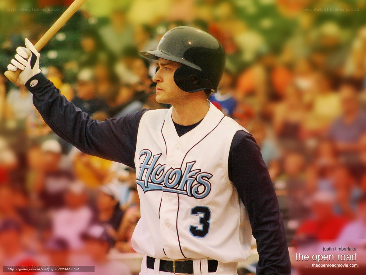 baseball player holding bat