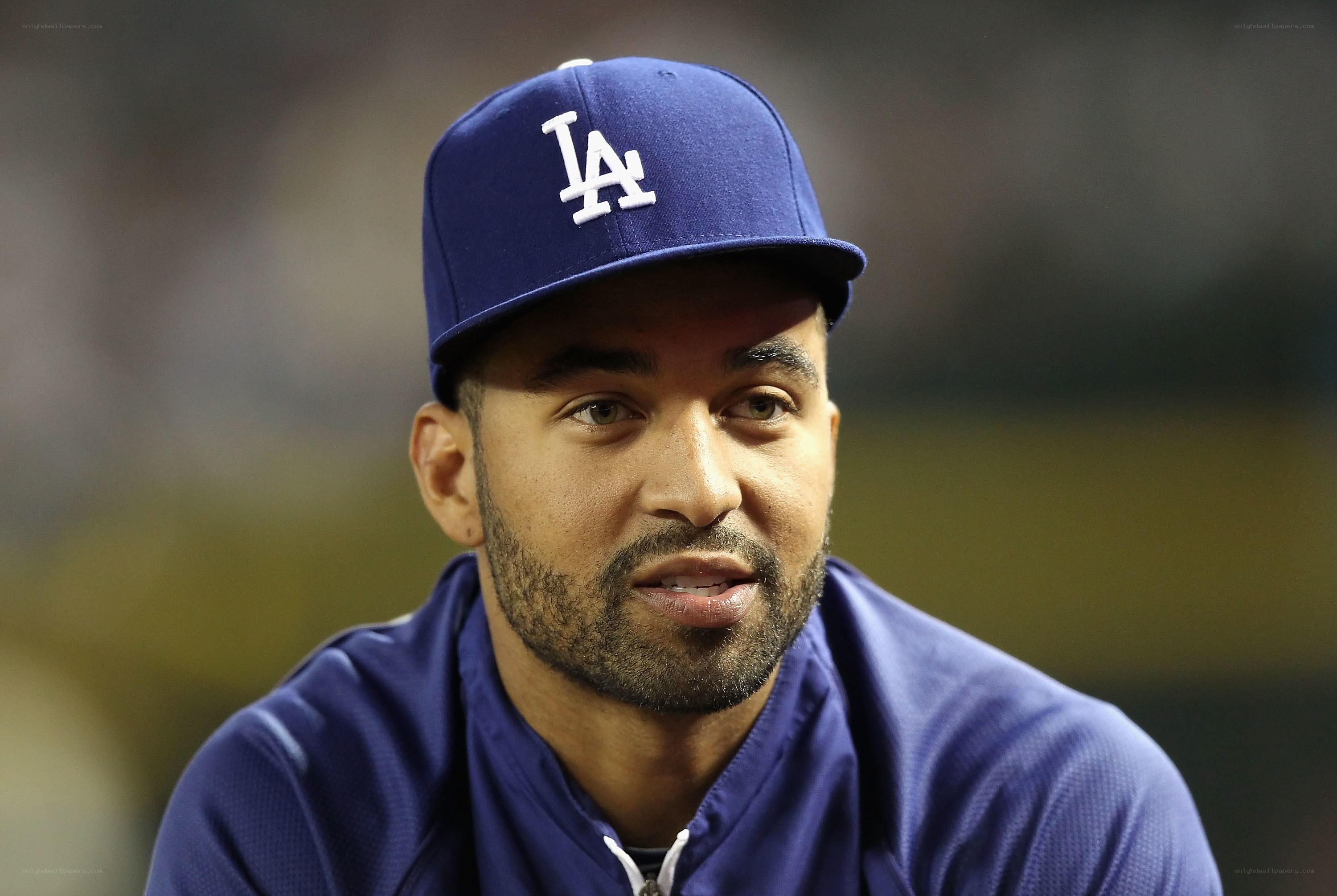 baseball player in Dodgers cap