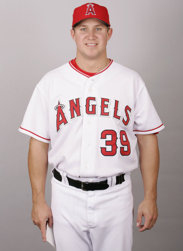 Baseball Player in Uniform — Cap
