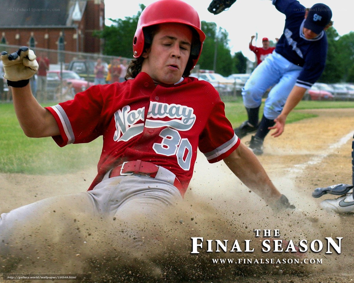 Baseball player sliding into base