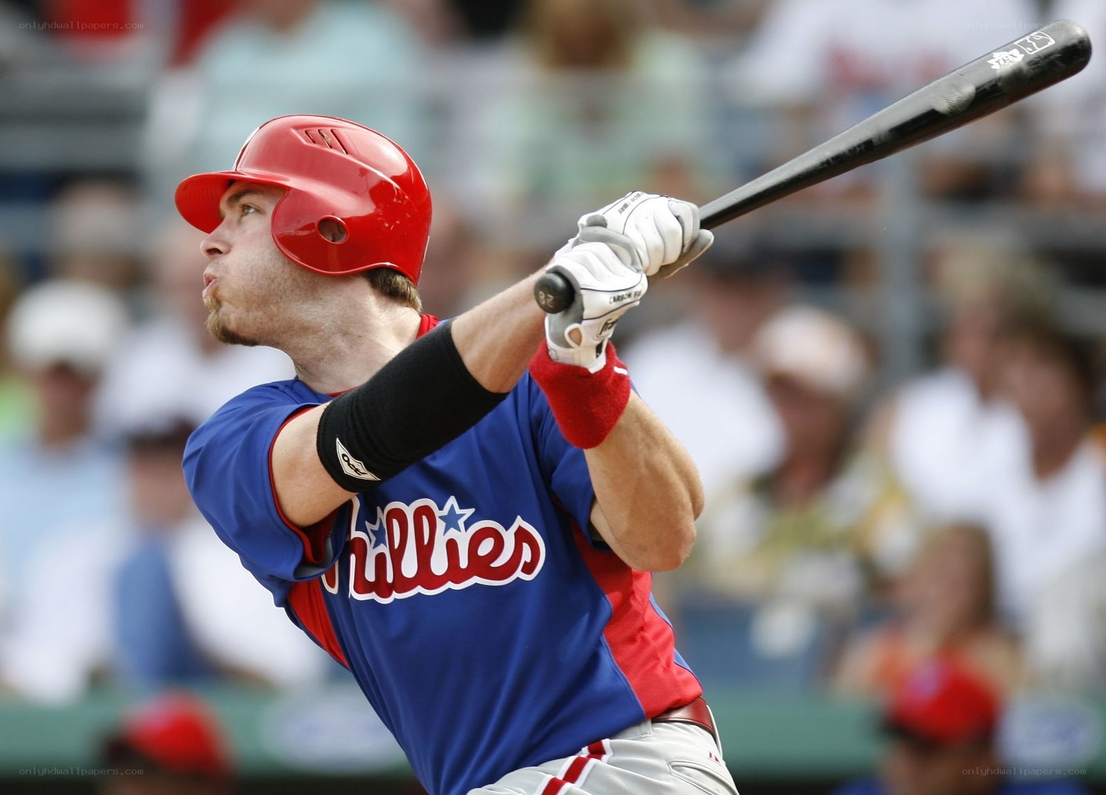 baseball player swinging bat