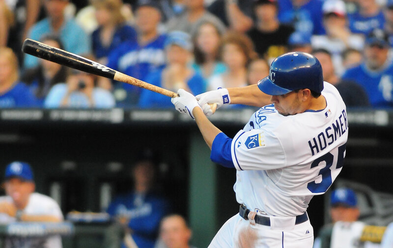 Baseball Player Swinging Bat — Blue