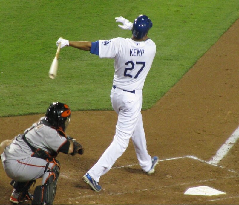 Baseball Player Swinging Bat — White, Active, Night