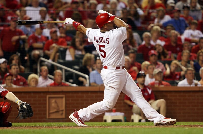 Baseball Player Swinging Bat — White