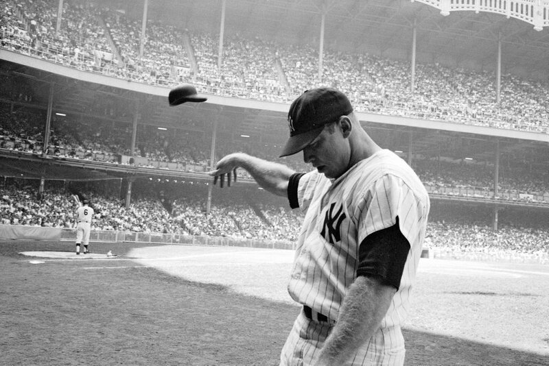 Baseball Player Throwing Cap