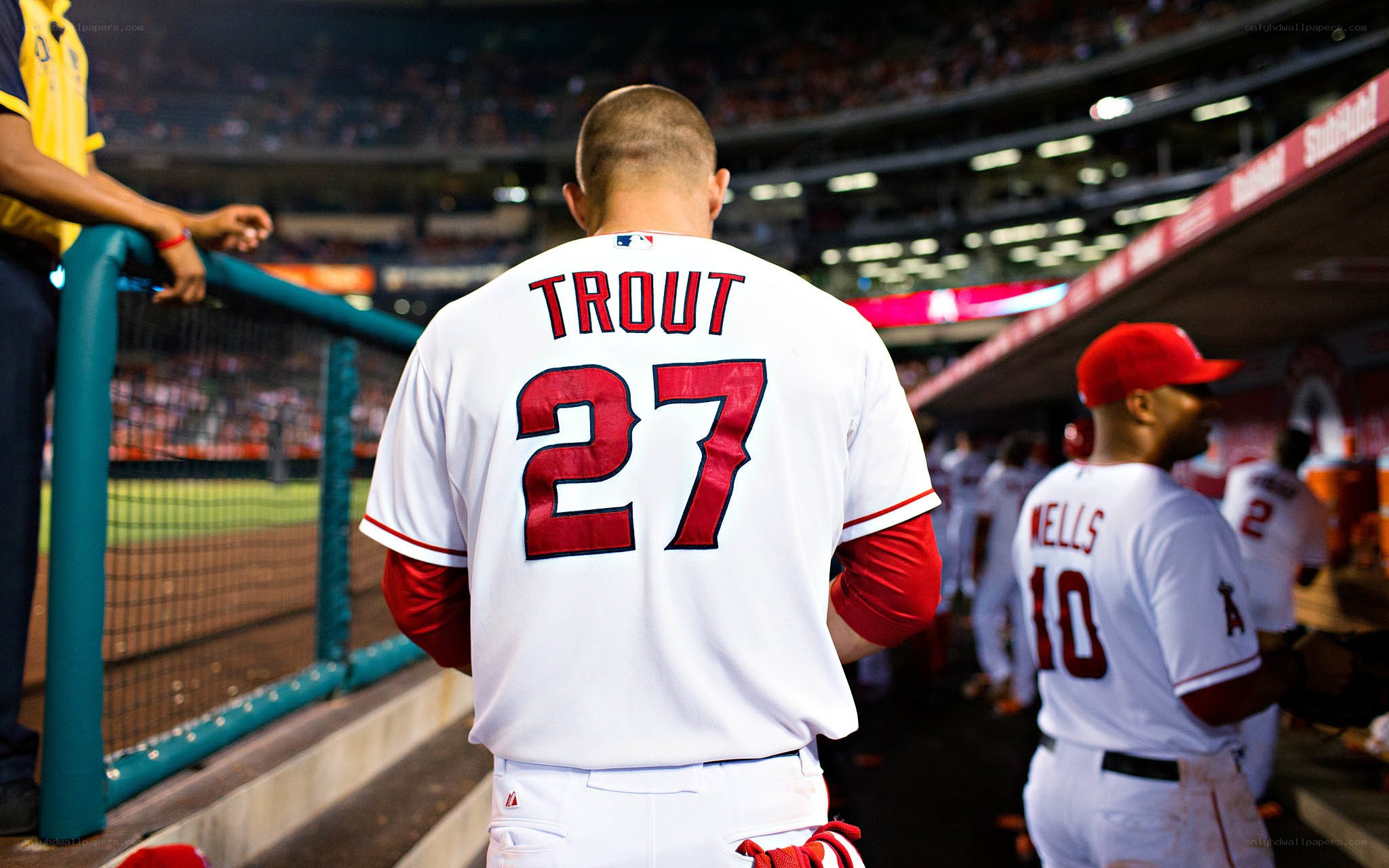 Baseball player walking to dugout